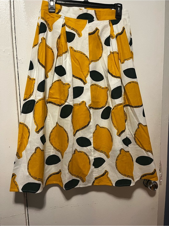 Chicwish Dresses & Skirts - Chicwish White Midi Skirt with Yellow Lemon Print